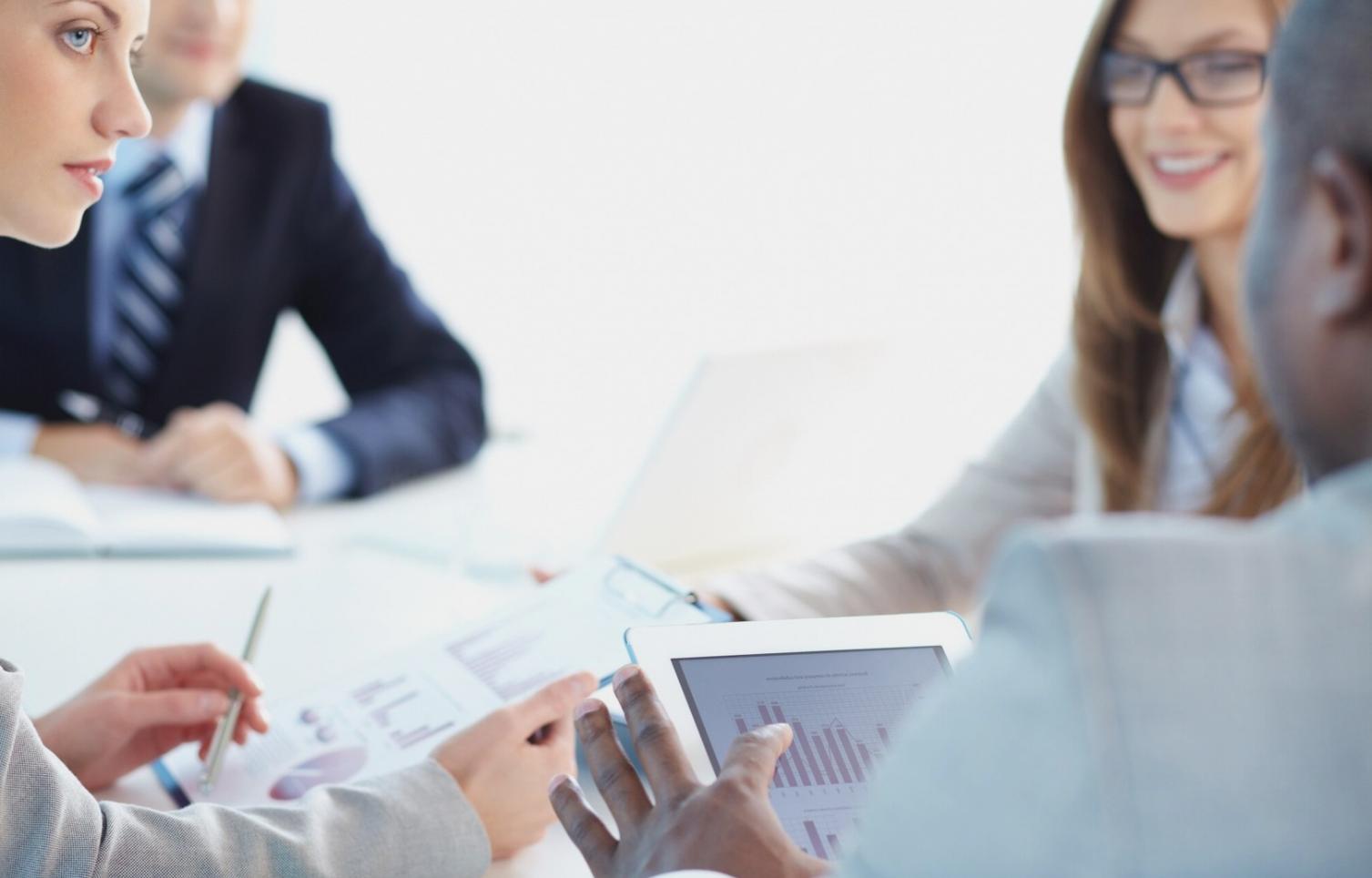 Workshop zur Budgetplanung mit Teilnehmern und Trainer